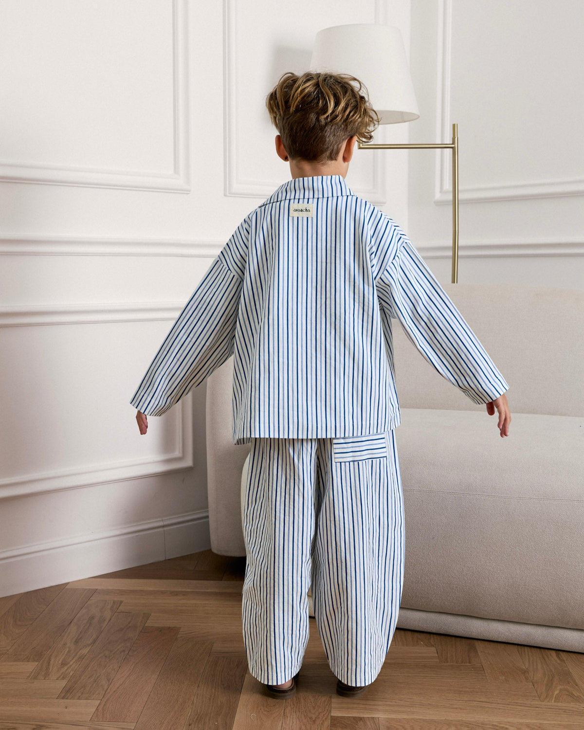 Back view of the Avaacha Kai striped shacket and balloon pants