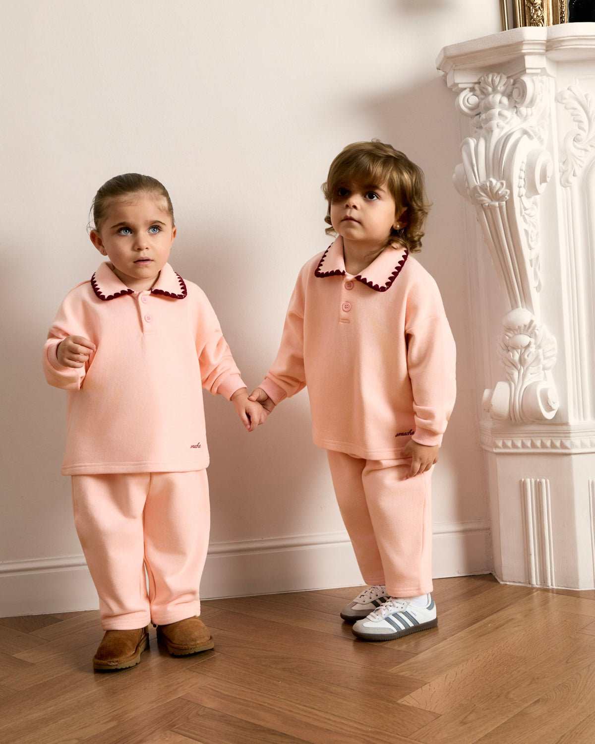 Two girls in matching Avaacha Mimi Tracksuits in Bubblegum