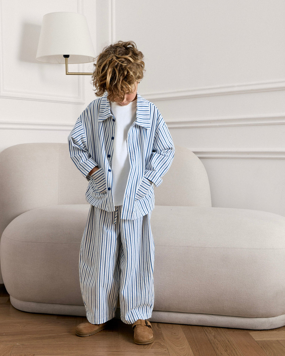 Boy in the Avaacha Kai Set in Sea Stripes, side view