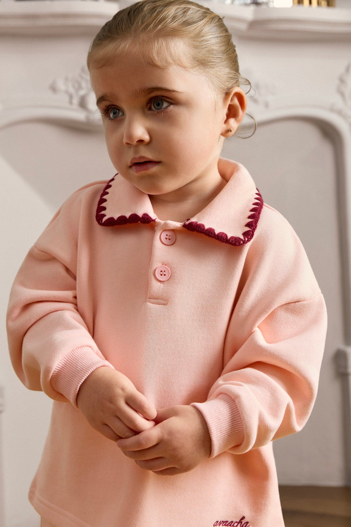 Toddler wearing the Avaacha Mimi Tracksuit in Bubblegum with crochet collar