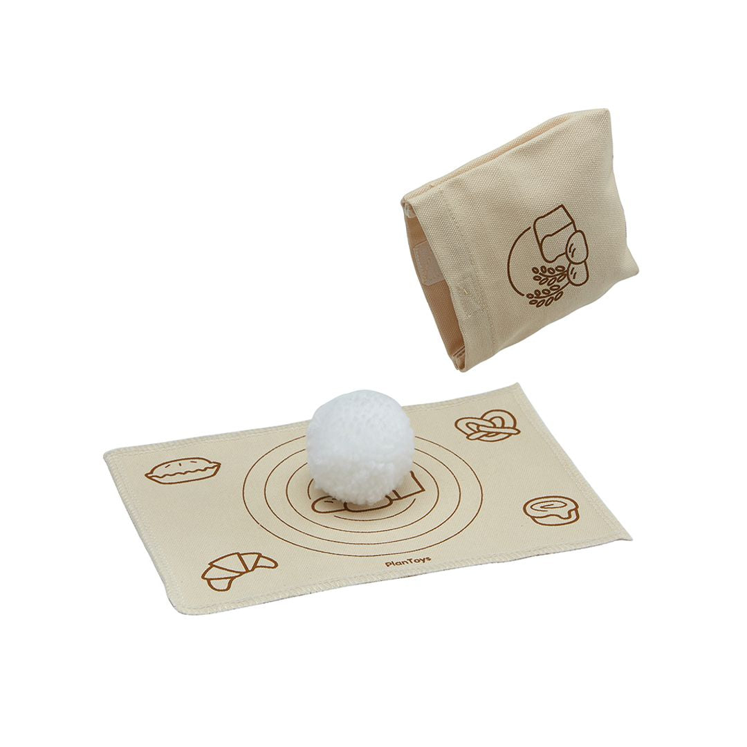 PlanToys bread loaf set with paper bag and dough ball