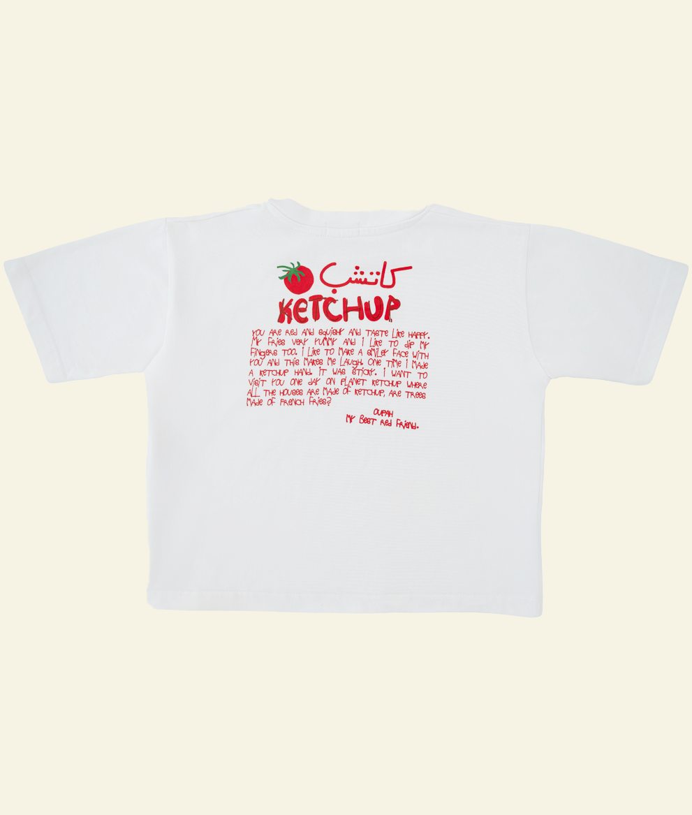 Back of the white Oupah Ketchup Tee with red bilingual Ketchup print