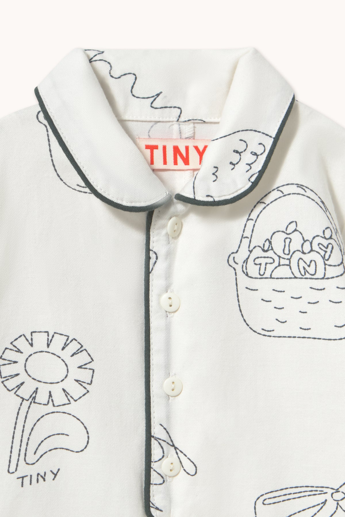 Close-up of the piped collar on the Tinycottons Tiny Apples pyjama