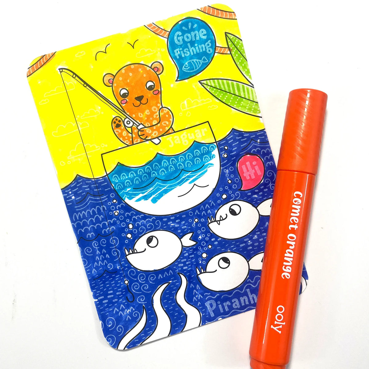Fish scene revealed on an Ooly Undercover Art Rainforest Fun card with a marker