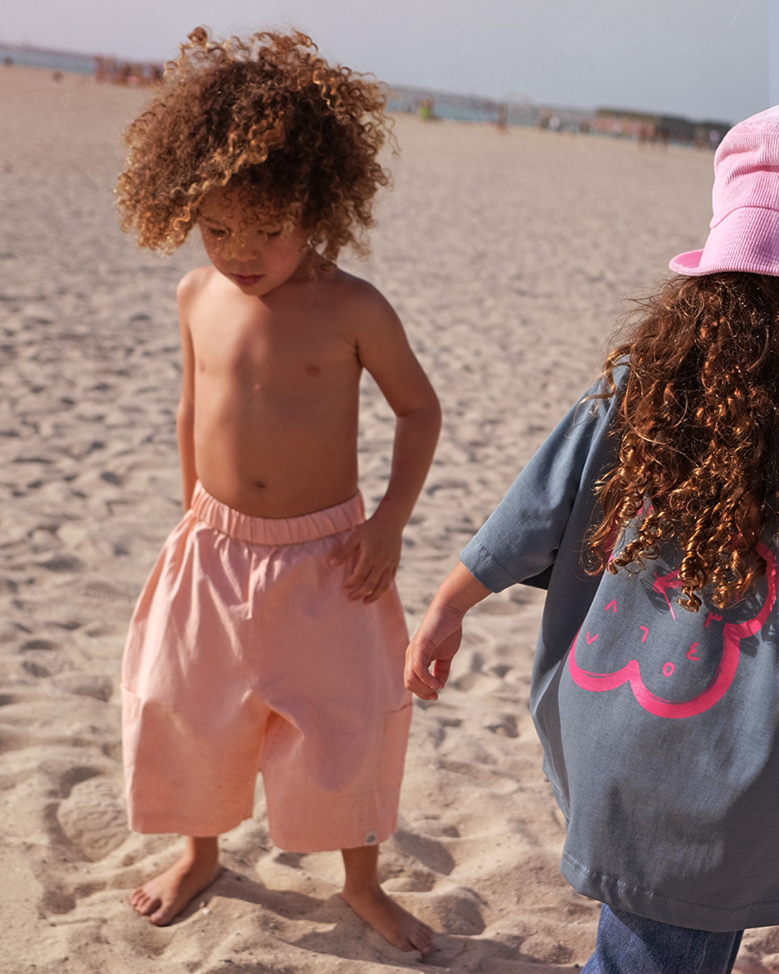 Kids playing outdoors in the Oupah Explorer Capris