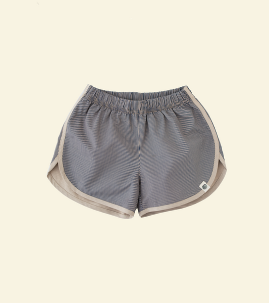 Front of the grey Oupah SunnyScout Shorts with contrast piping